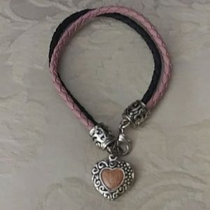 Ptetty pink and black braided braceket